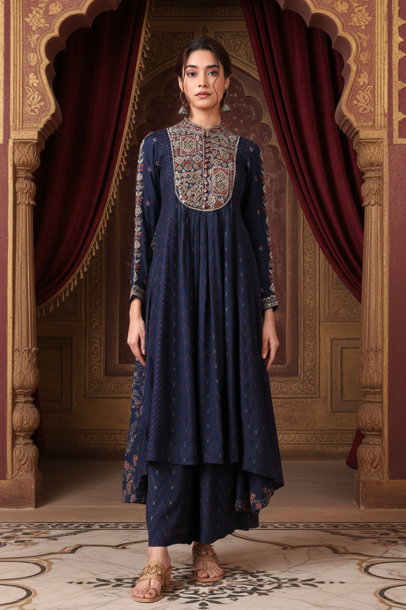 Woman wearing a navy blue embroidered traditional outfit 