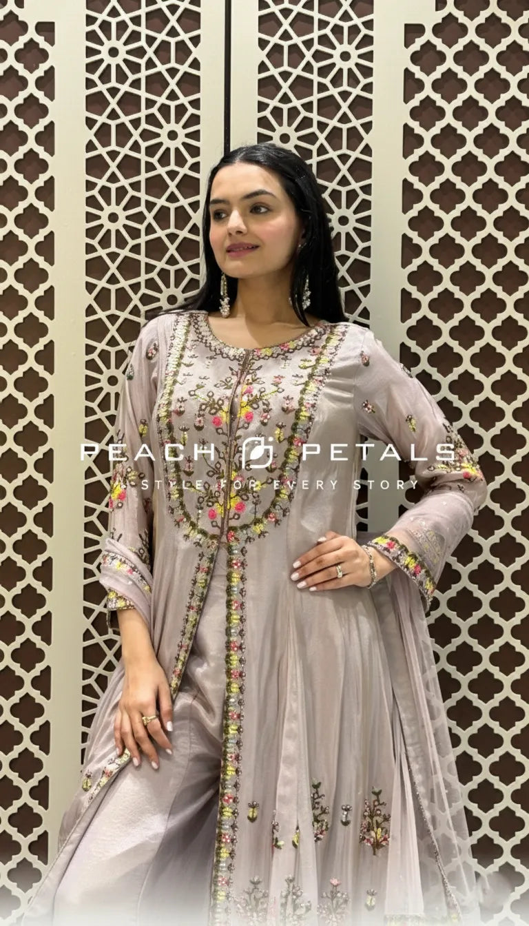 Dusty mauve longline tunic featuring colorful floral embroidery paired with matching wide-leg silk palazzo pants.