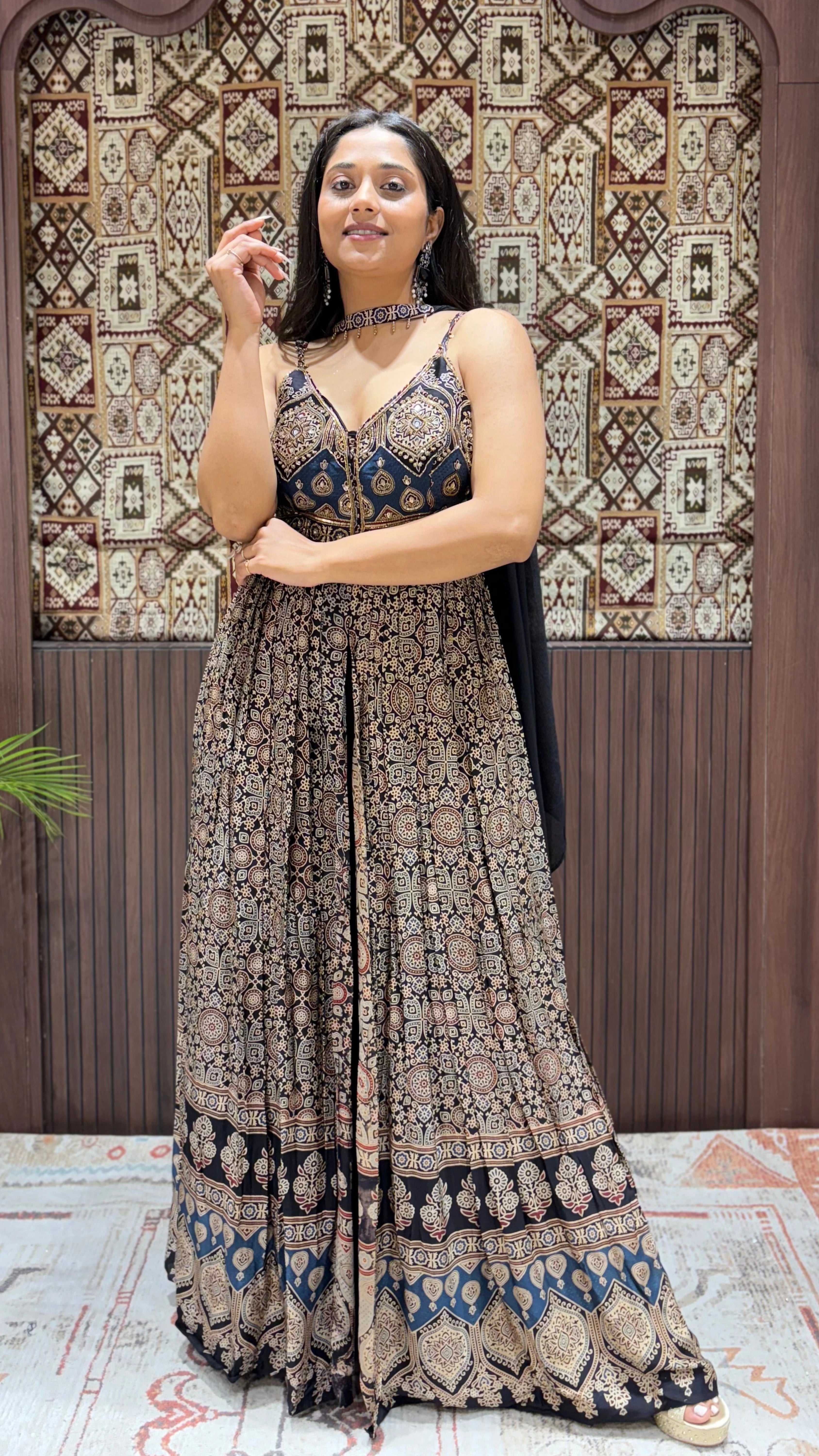 Black and indigo Ajrakh print flared maxi dress with noodle straps and embellished sweetheart bodice.