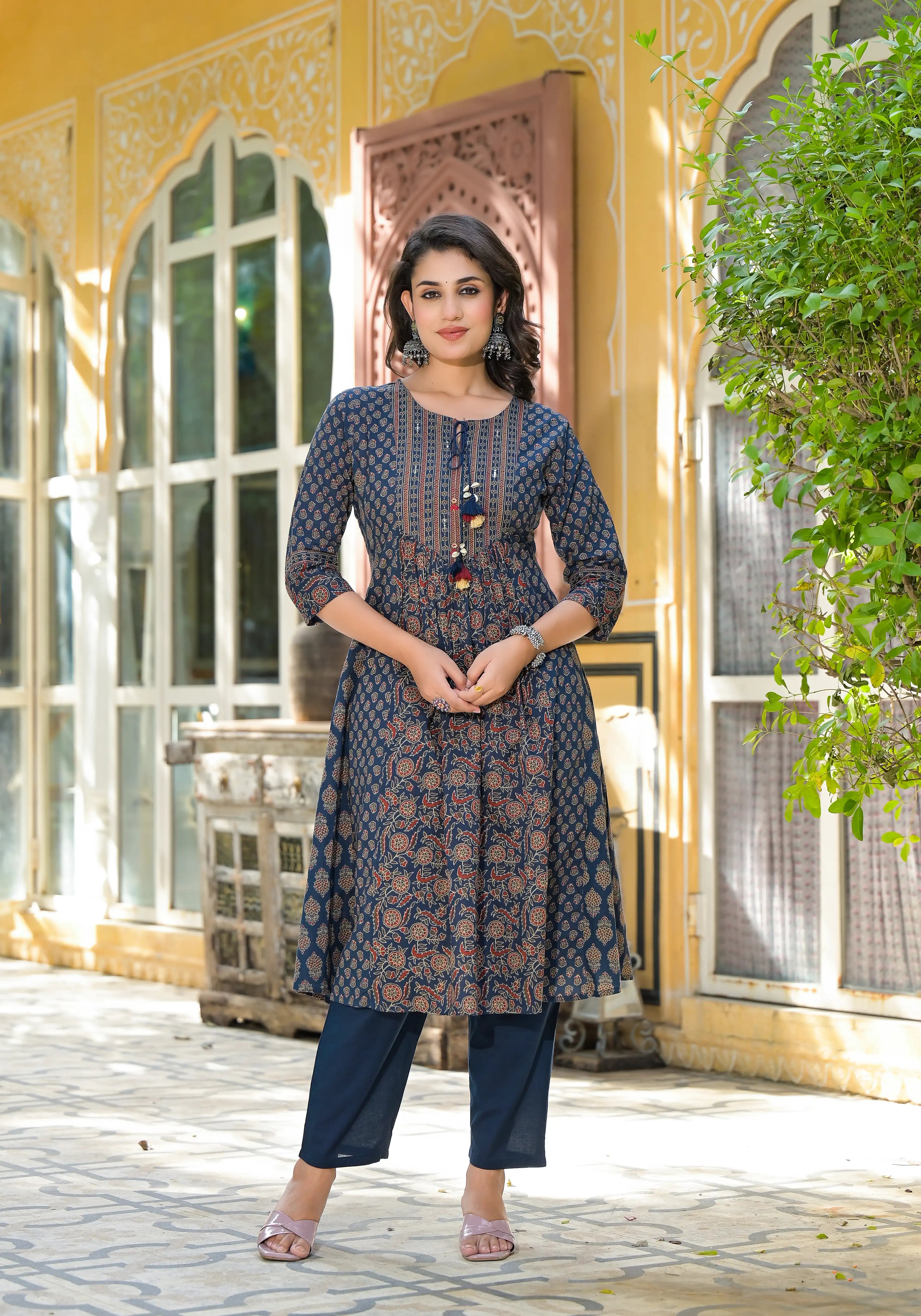 An Anarkali cotton kurta with a pant set is a beautiful and elegant ensemble.