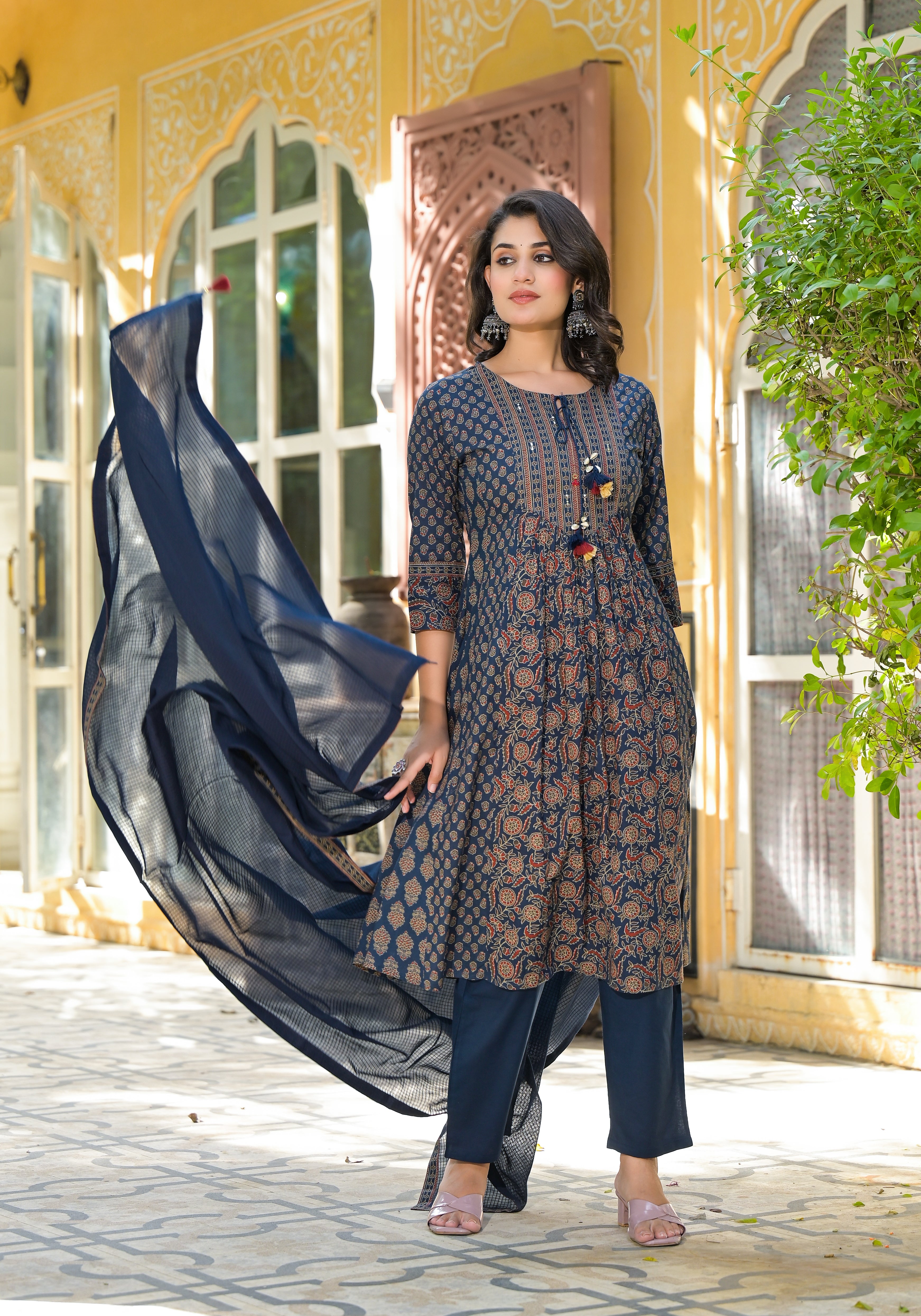 An Anarkali cotton kurta with a pant set is a beautiful and elegant ensemble that combines comfort with traditional charm.
