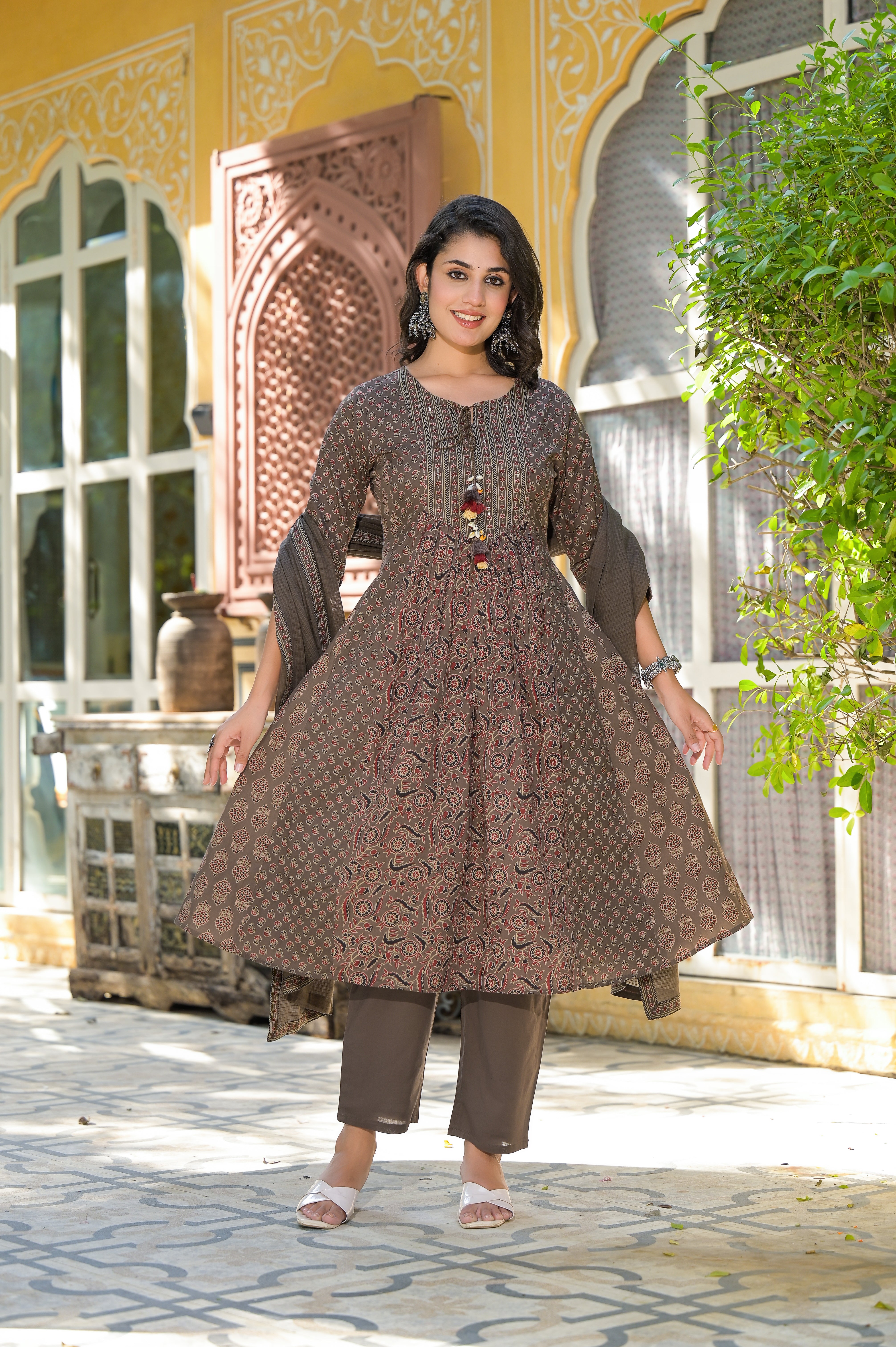 An Anarkali cotton kurta with a pant set is a beautiful and elegant ensemble that combines comfort with traditional charm.