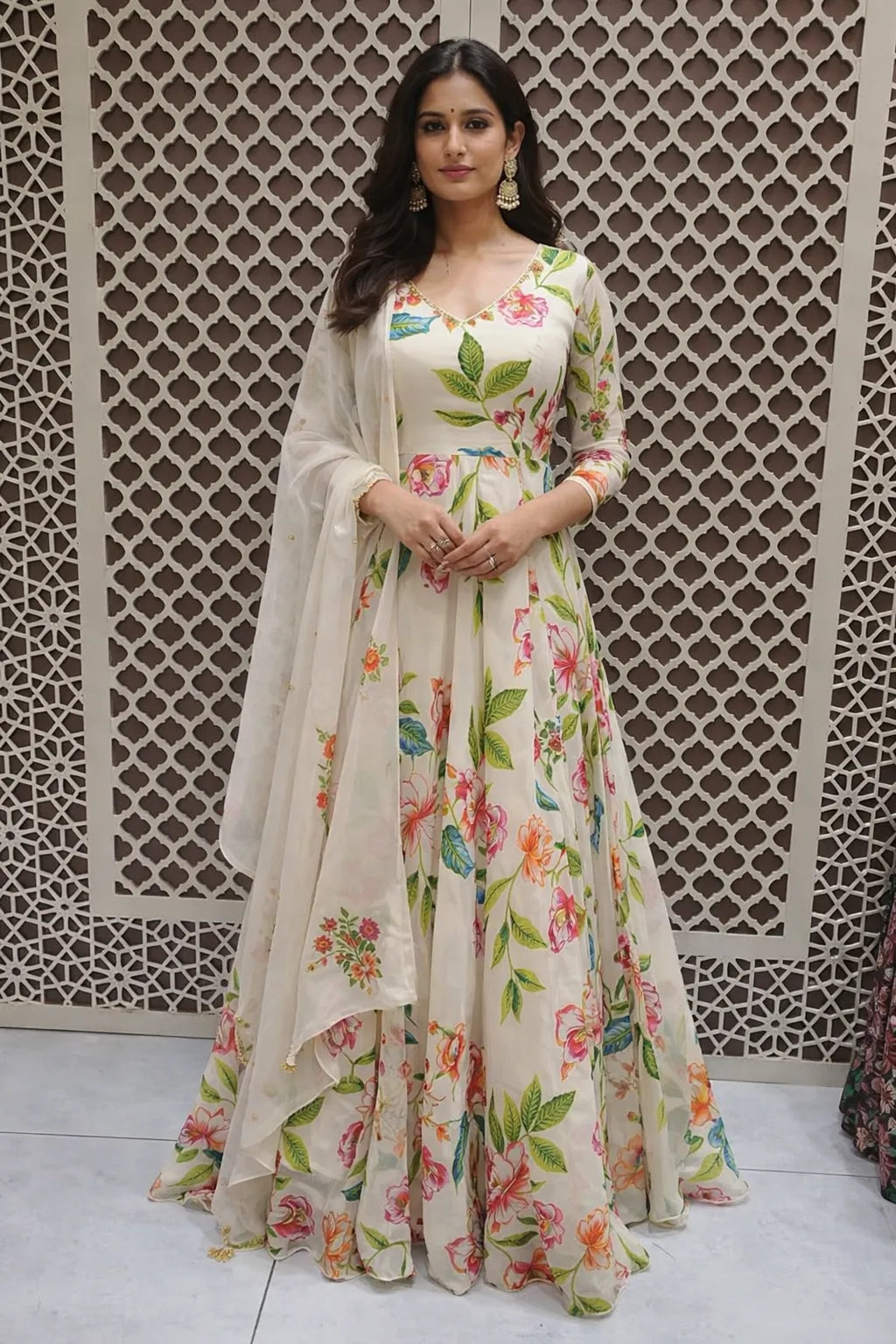 Woman wearing a floral dress with a light background