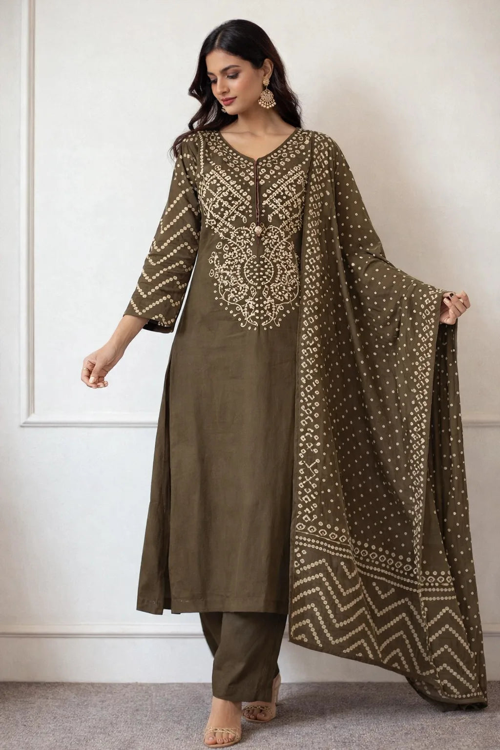 Olive green ethnic kurta featuring intricate light-colored patterns on the neckline, paired with a matching dupatta.